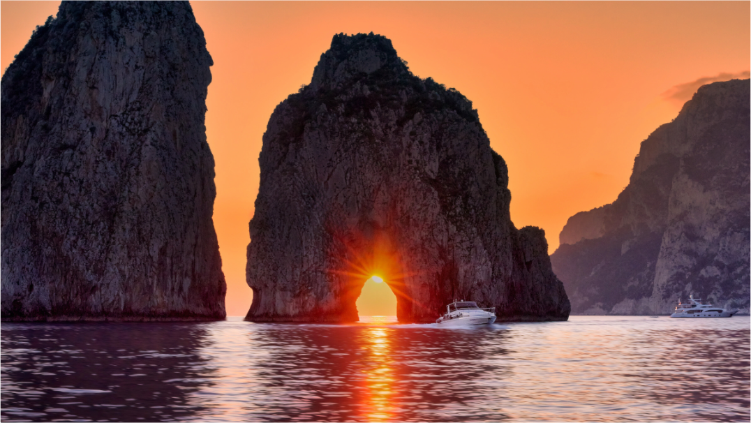 Main image Leaving Capri—Faraglioni Sunstar at Sunset